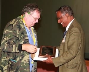 Steve
Stache (left) receives his award from Dr. Vasu Melepati.