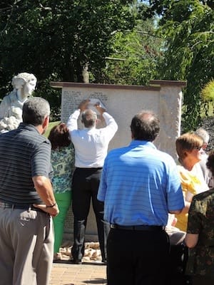 Families find their loved ones’ names on the Celebration of Life Wall at The Center for Compassionate Care in Mt. Lebanon.