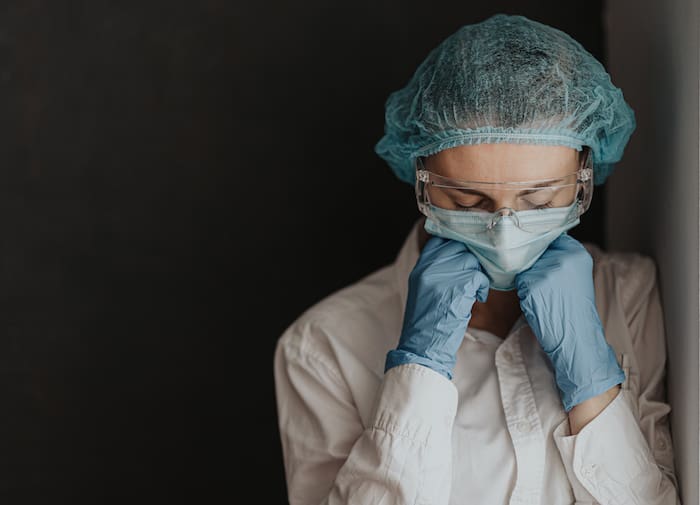 tired medical worker doctor after taking a large number of patients due to the epidemic of coronavirus