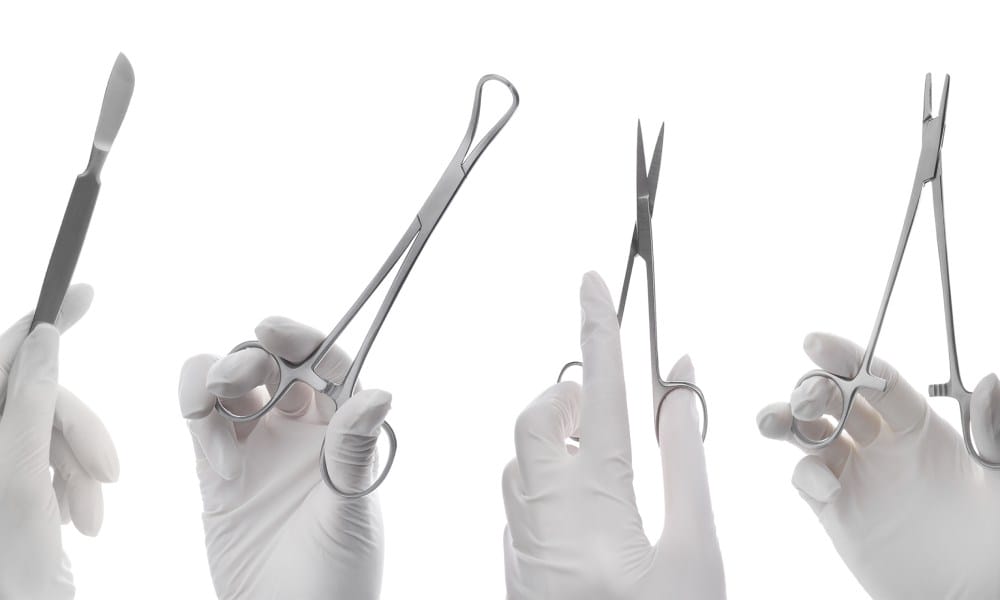 A series of gloved hands holding reusable medical instruments, including tweezers, a scalpel, and three different scissors.